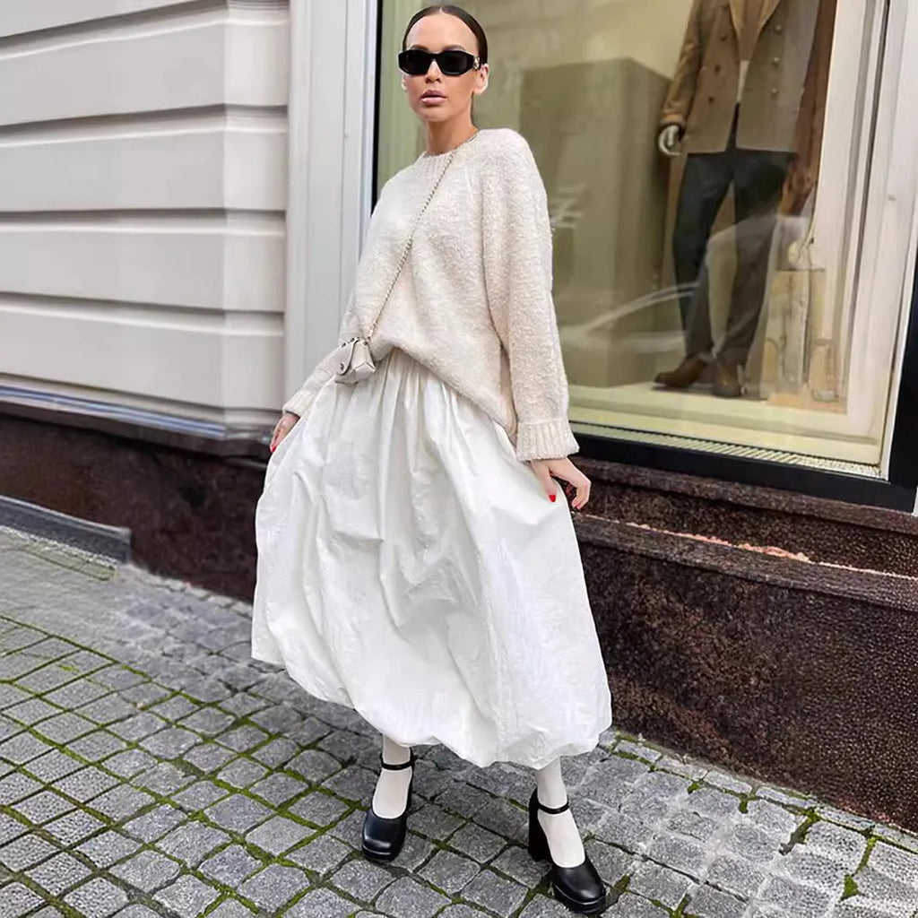 Women's cotton long skirt in solid black or white colour with office-appropriate styling