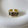Adjustable geometric copper ring with a distressed electroplated finish in a choice of colours.