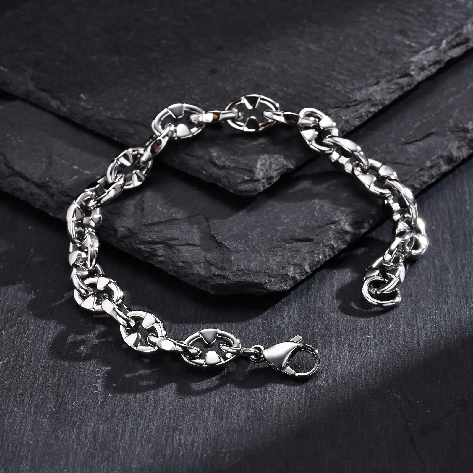 Handmade geometric stainless steel chain bracelet for men in a steel colour.
