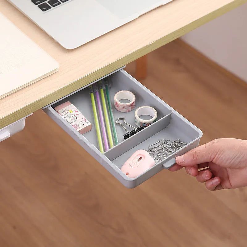 Plastic under-table storage drawer with adhesive mounting in grey colour