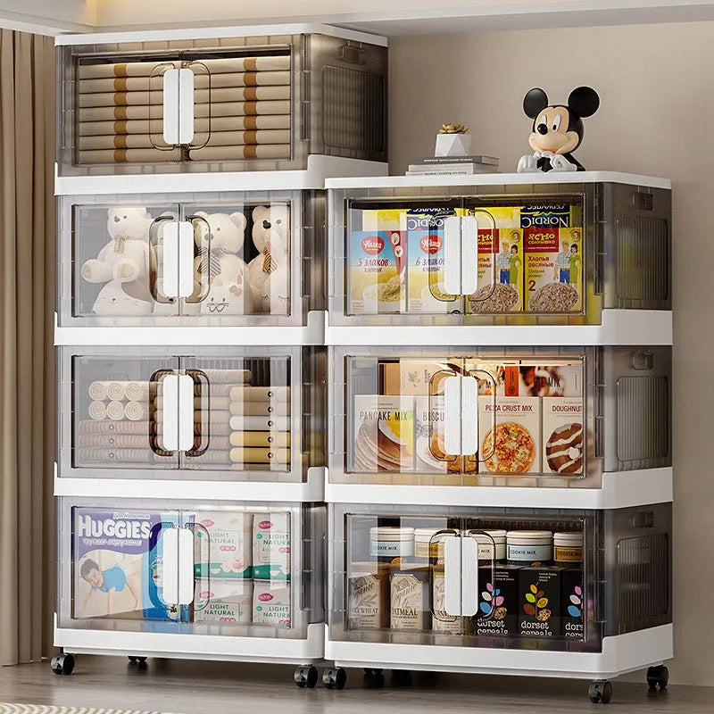 Foldable white household storage locker with wheels and multiple shelves for shoes and toys.