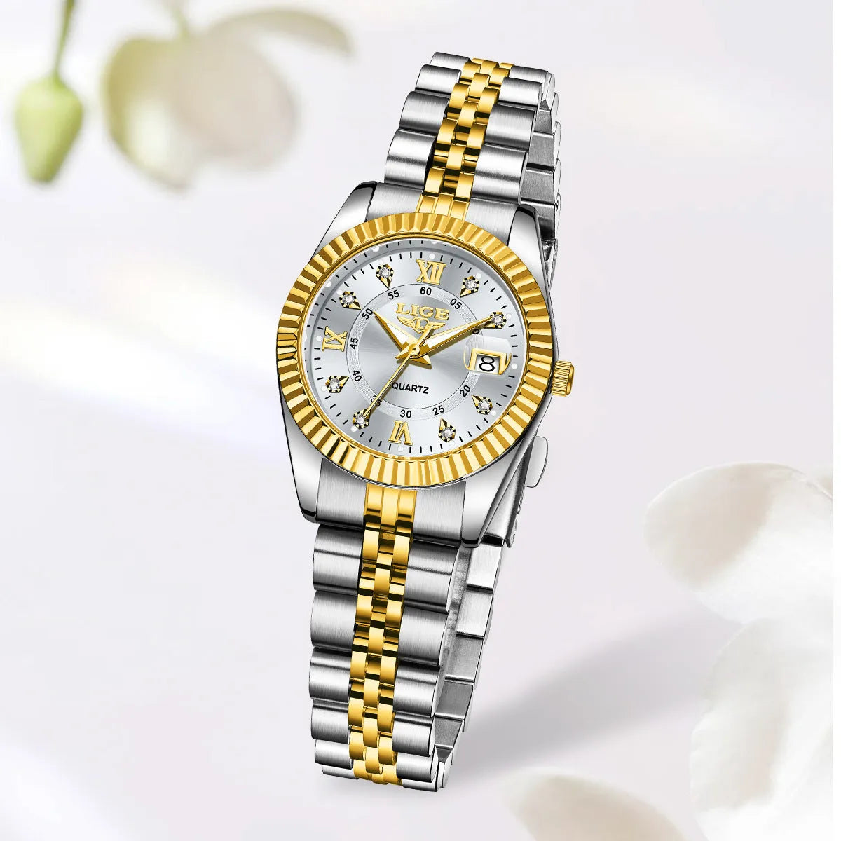Women's waterproof quartz watch with 10mm case in gold or silver with contrasting dial colours