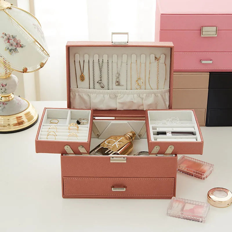 Hard leather jewellery storage box in beige, black, pink, or rose gold colour.