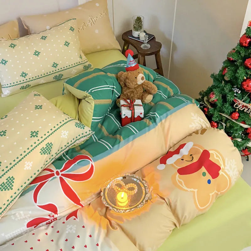 Christmas cartoon print bedding four-piece set on a bed, showing duvet cover and pillowcases.