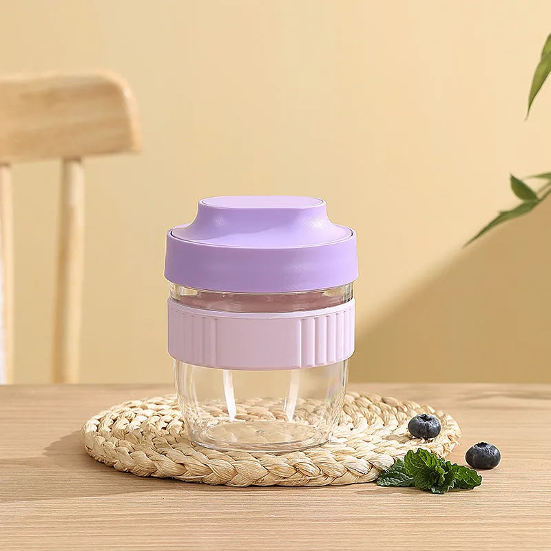 Green microwave-safe plastic salad cup with white resealable lid and integrated spoon, shown with capacity options.