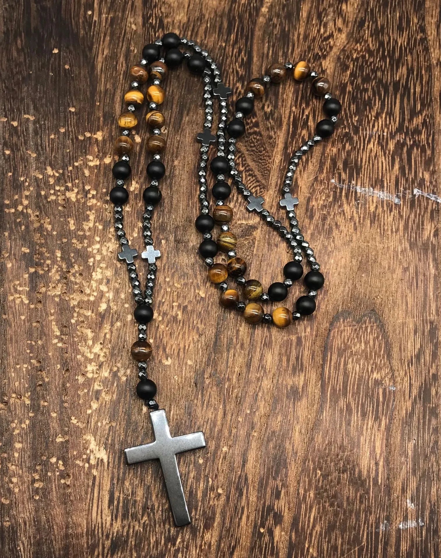 Men's stone cross pendant necklace with hand-woven detail on ball bead chain