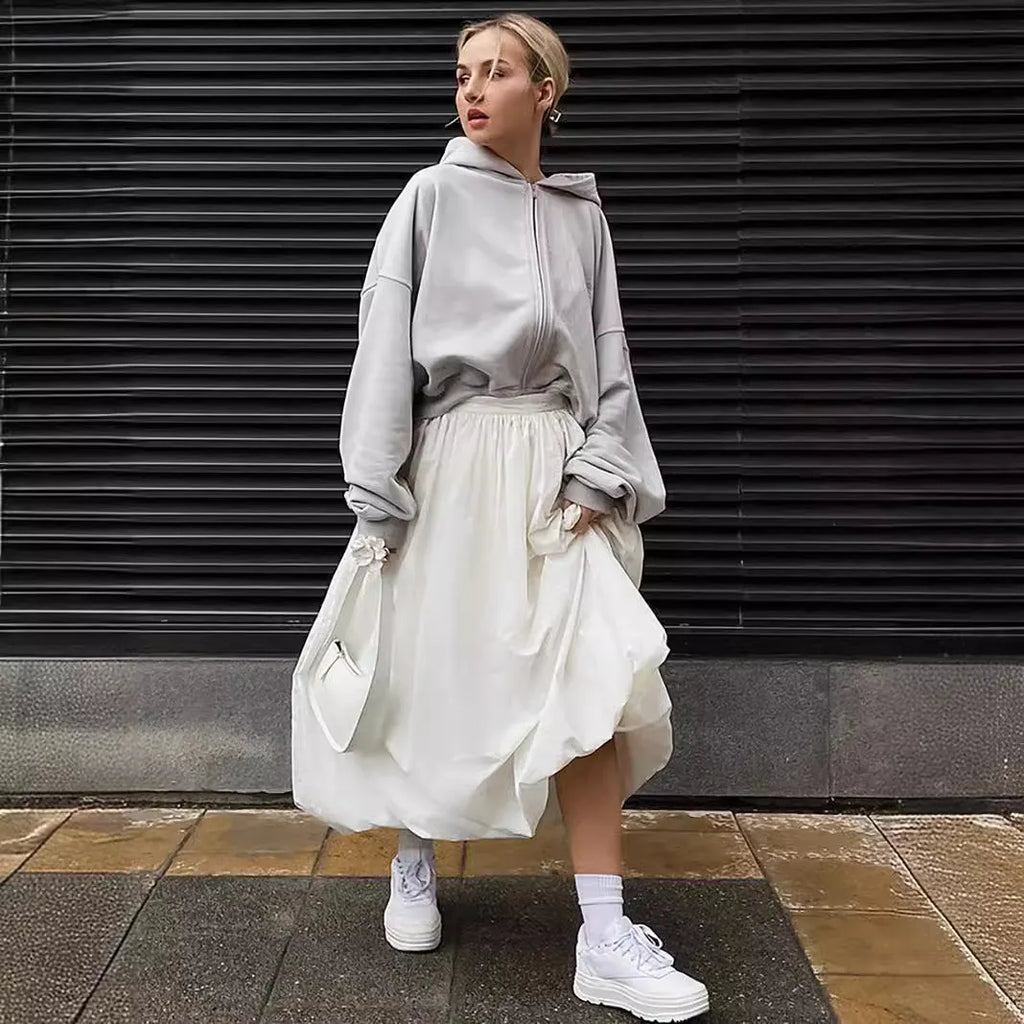 Women's cotton long skirt in solid black or white colour with office-appropriate styling