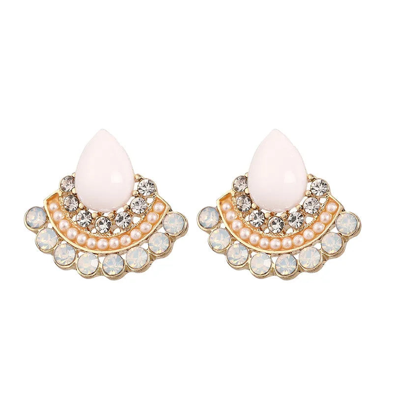 Women's silver-colour retro fan-shaped stud earrings with rhinestone detail on a white background.