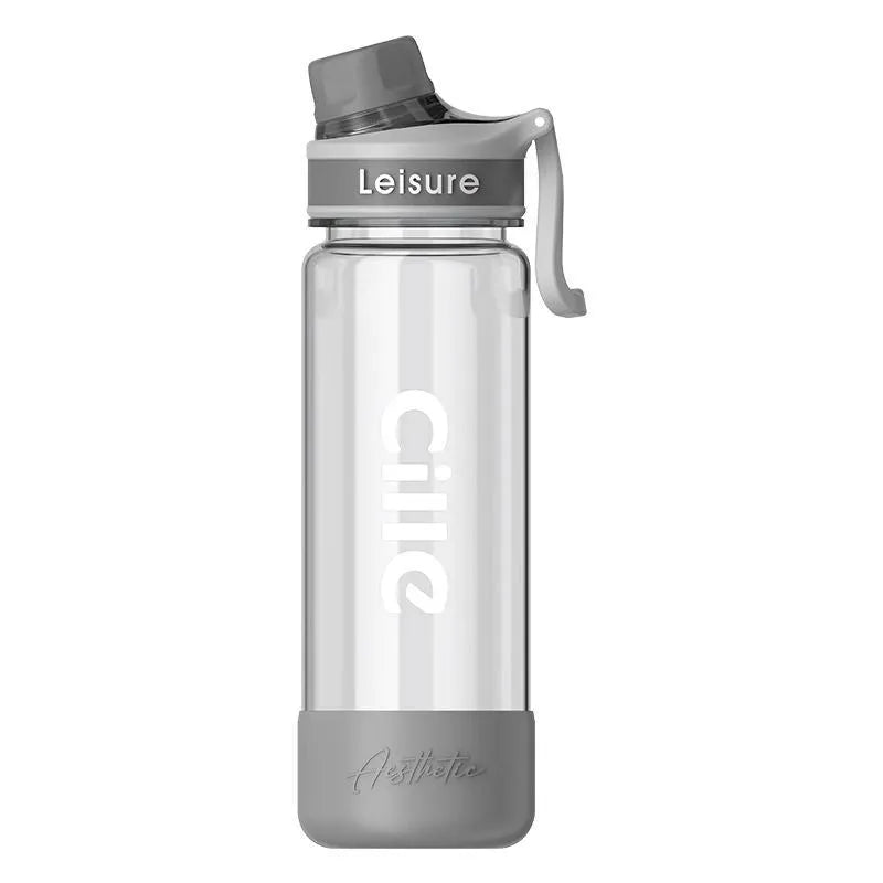 Cartoon pattern plastic straw cup in grey, green, or pink, showing heat-resistant and portable design.