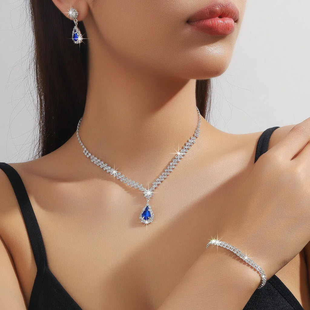 Claw chain rhinestone jewellery set with water drop design in blue, red, green, pink or white colours