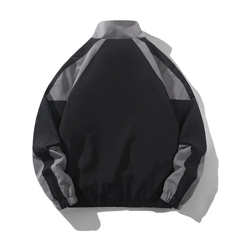 Men's black polyester jacket with contrast stitching and side seam pockets on a model