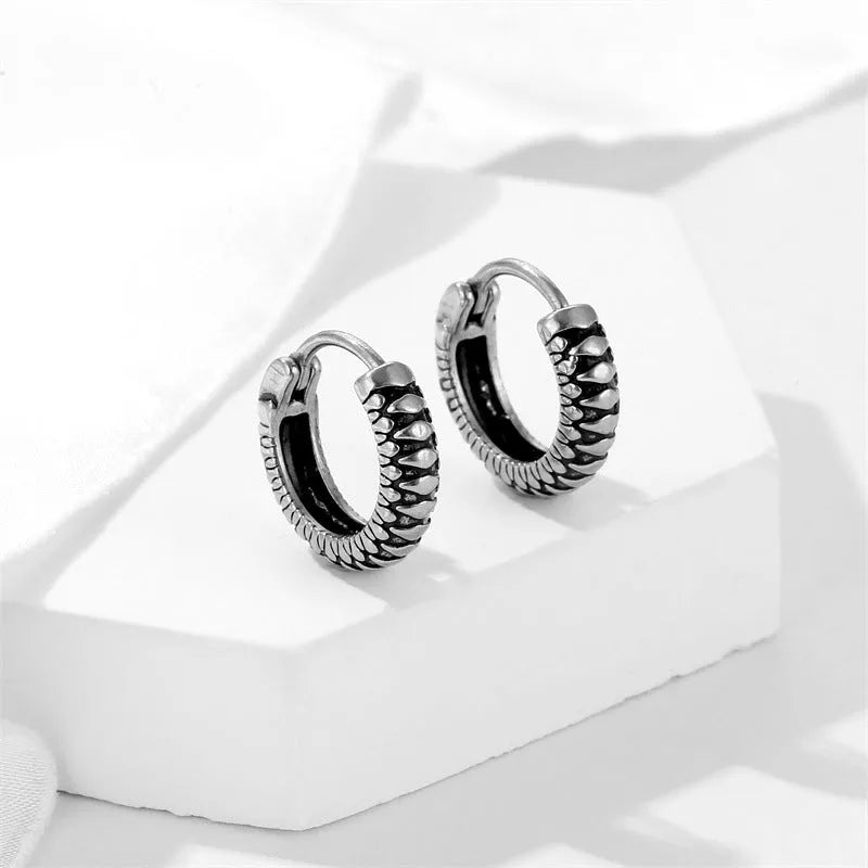 Silver geometric retro twist stripe drop earrings with round elements and sports style design