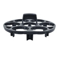 Black plastic egg holder cooking basket rack on a kitchen counter.
