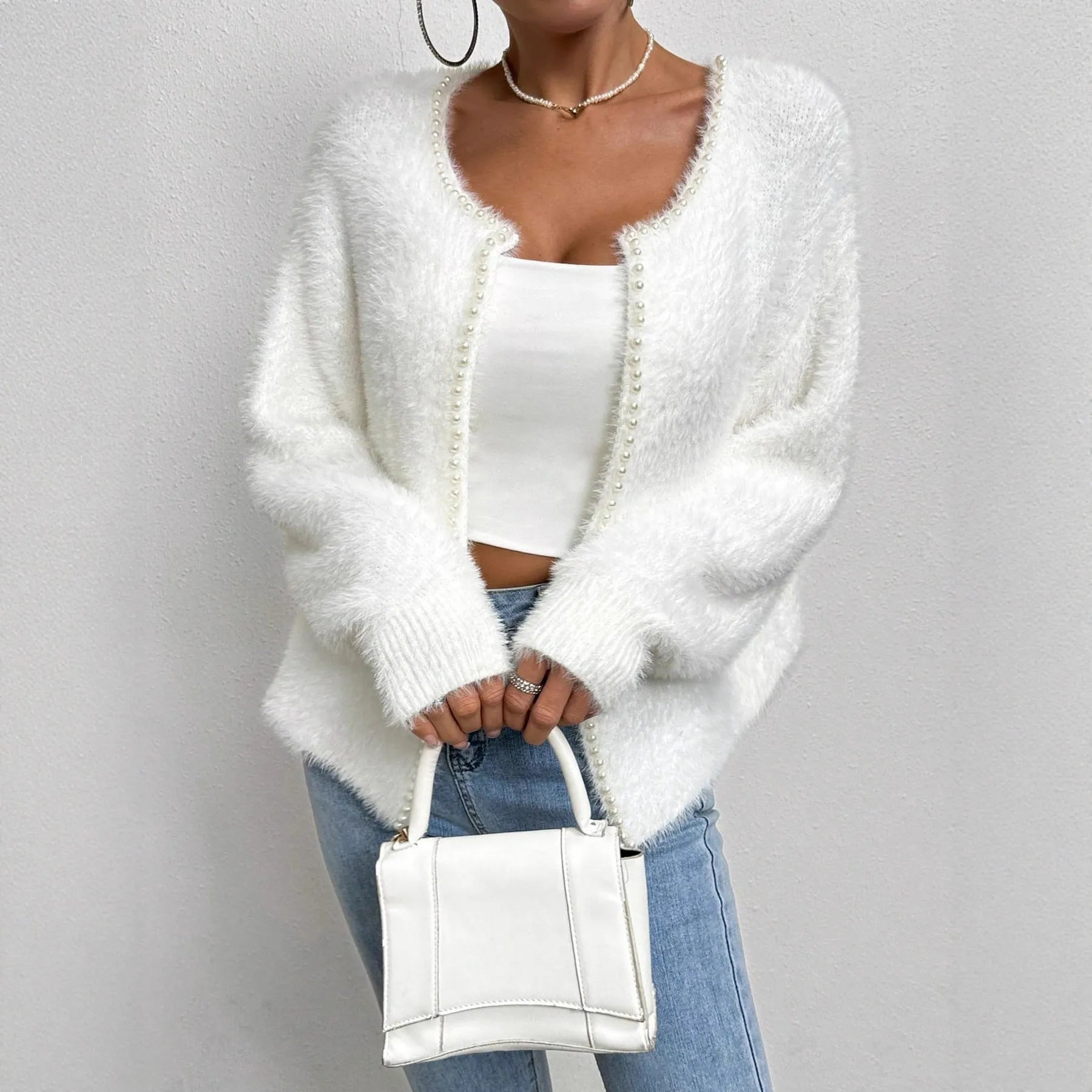White women's cardigan with V-neck and beaded knit detail