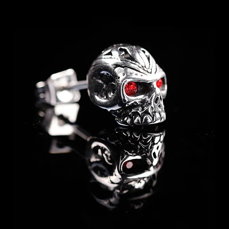 Retro red eye ghost head skull stud earrings with alloy construction and gemstone inlays