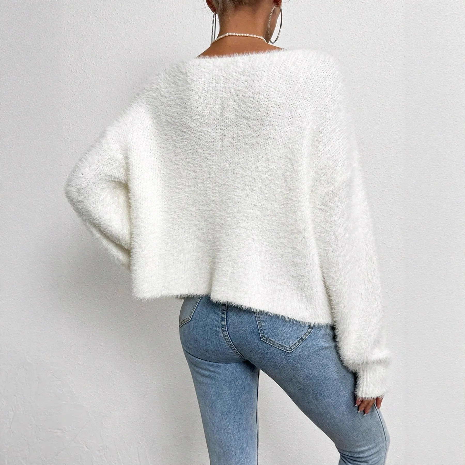 White women's cardigan with V-neck and beaded knit detail