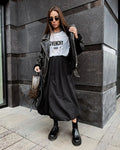 Women's cotton long skirt in solid black or white colour with office-appropriate styling