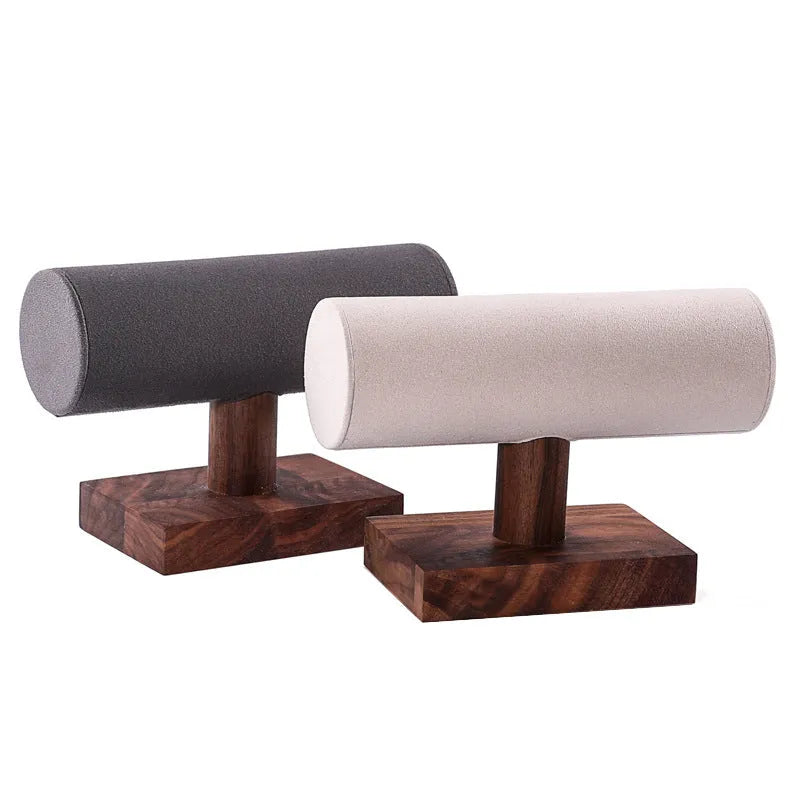 Walnut bracelet display stand with solid wood frame and beige velvet cushion