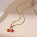 Strawberry fruit pendant necklace for women in stainless steel alloy with red or white gradient colour options