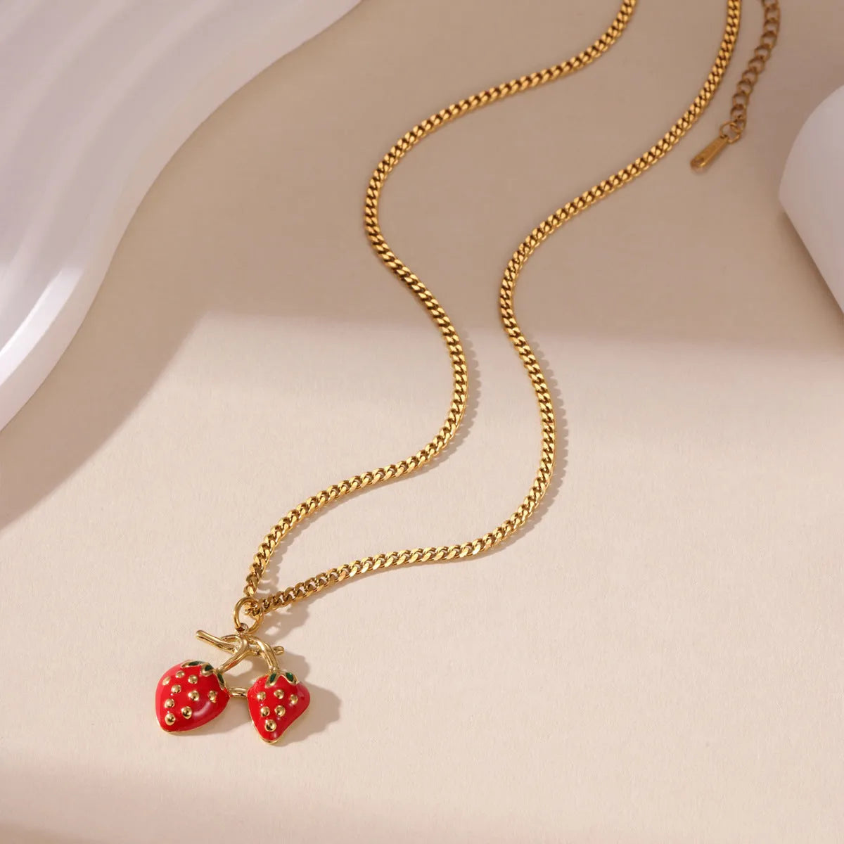 Strawberry fruit pendant necklace for women in stainless steel alloy with red or white gradient colour options