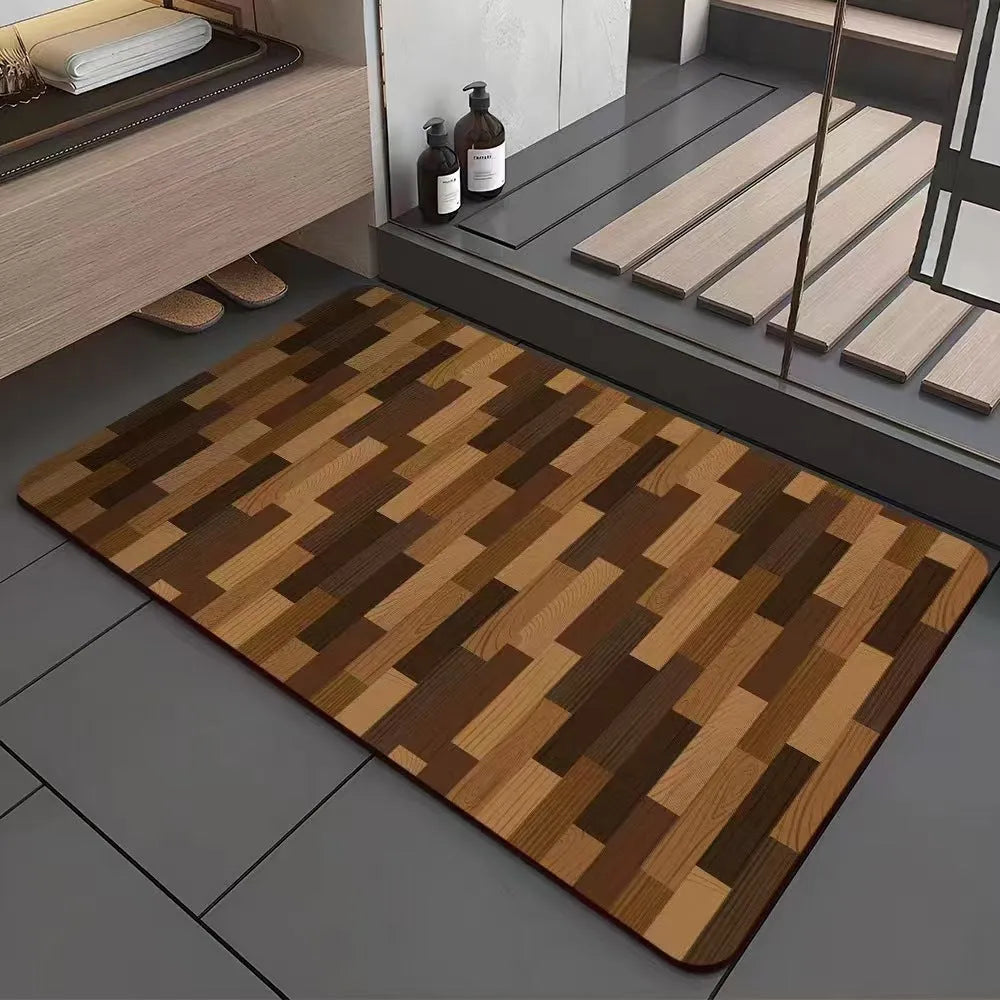Square diatomite bathroom mat with wood grain pattern on a bathroom floor.