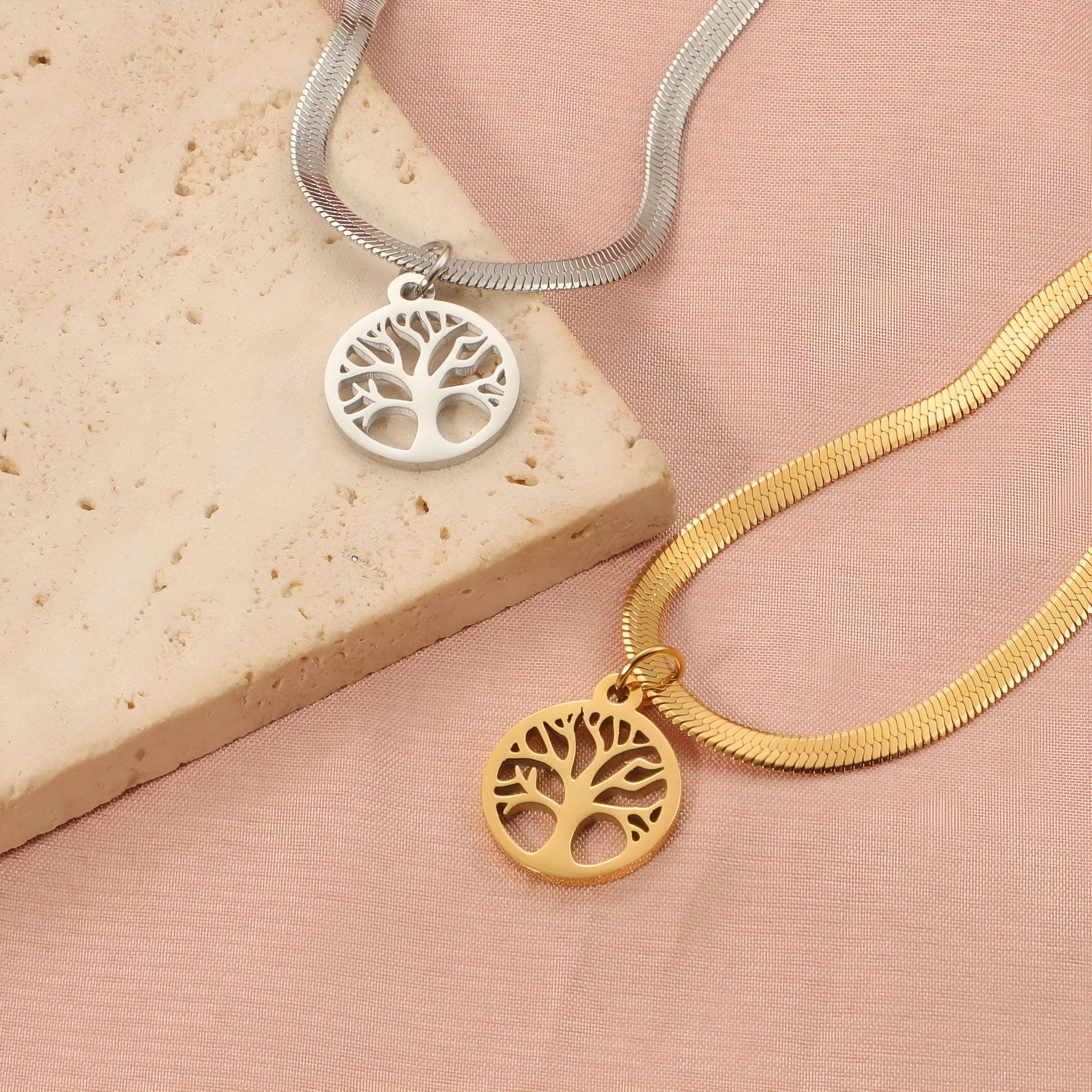 Stainless steel necklace with a U-shaped titanium steel tree pendant on a snake bones chain.