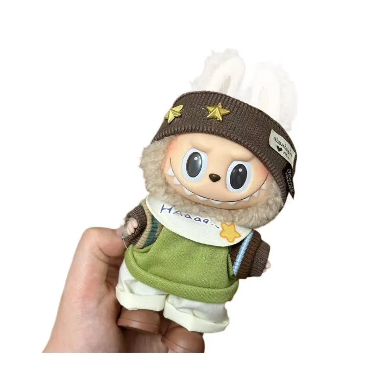 Plastic doll costume outfit designed for 17cm tall vinyl figurines on a display stand.