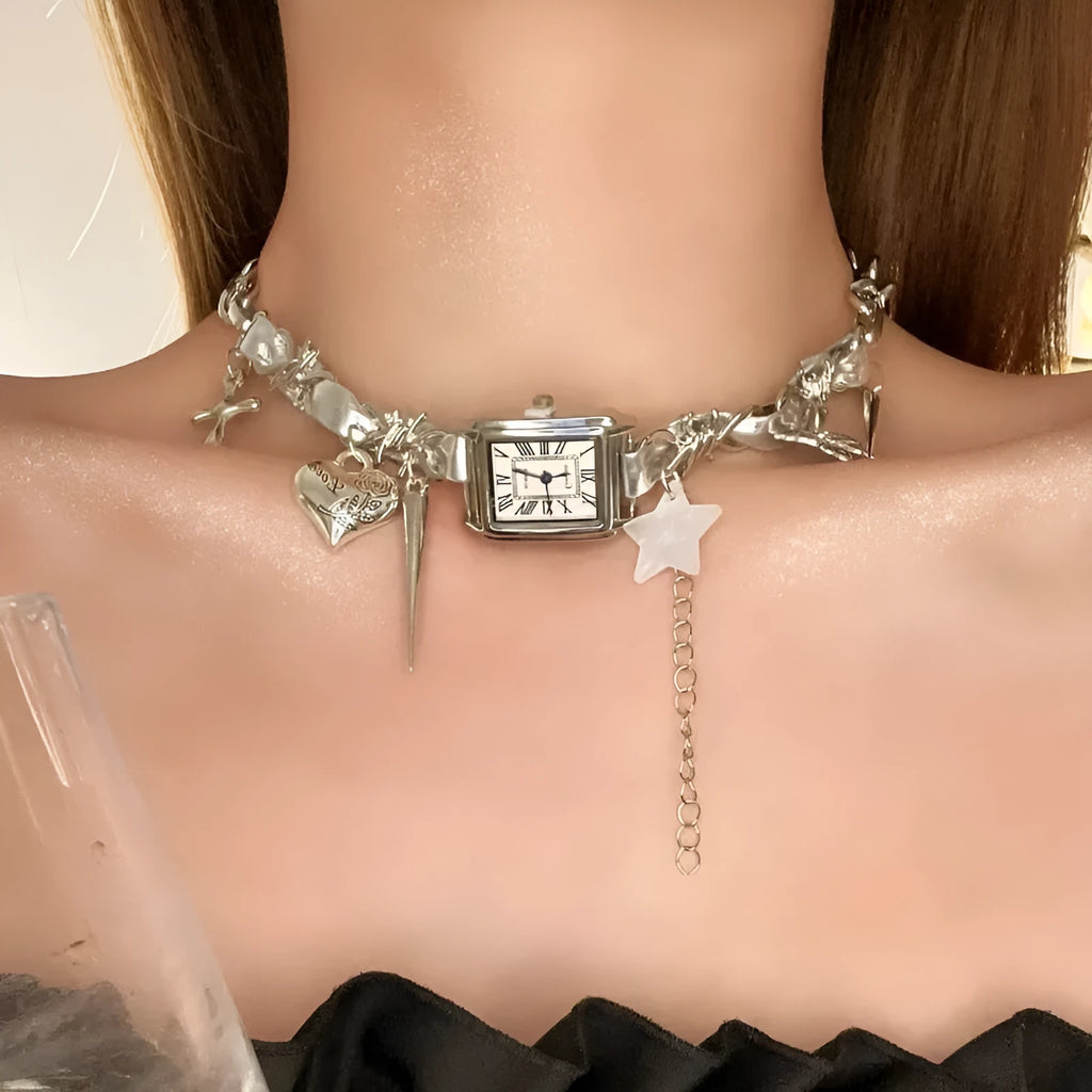 Dark multi-layer cross necklace with twin clavicle chain and textured hemp flowers chain on model