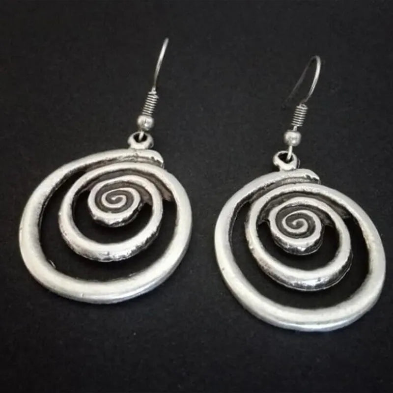 Geometric spiral earrings in distressed silver with national style design elements