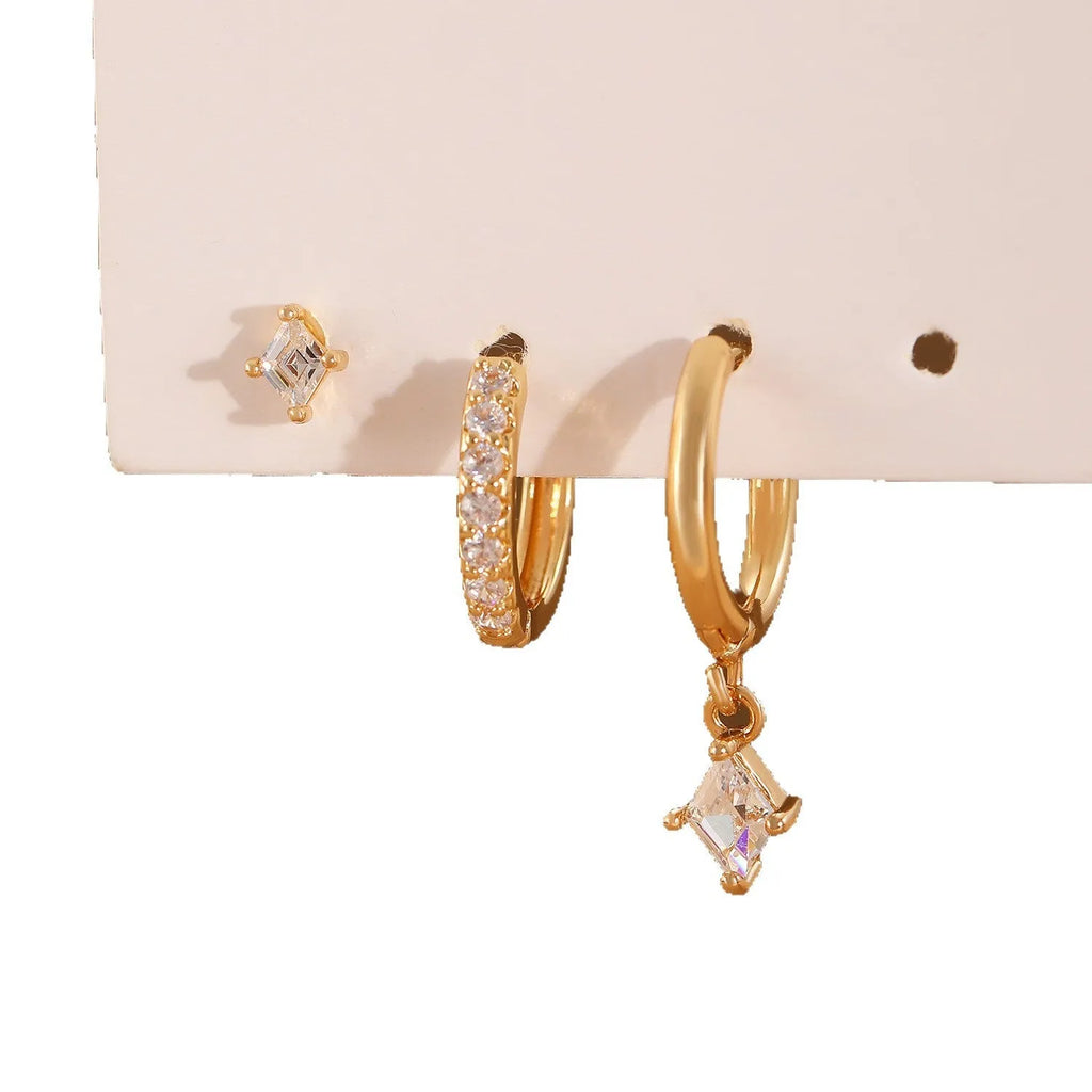 Ladies three-piece zircon inlaid geometric earring set with pendant, stud and clip styles in gold finish