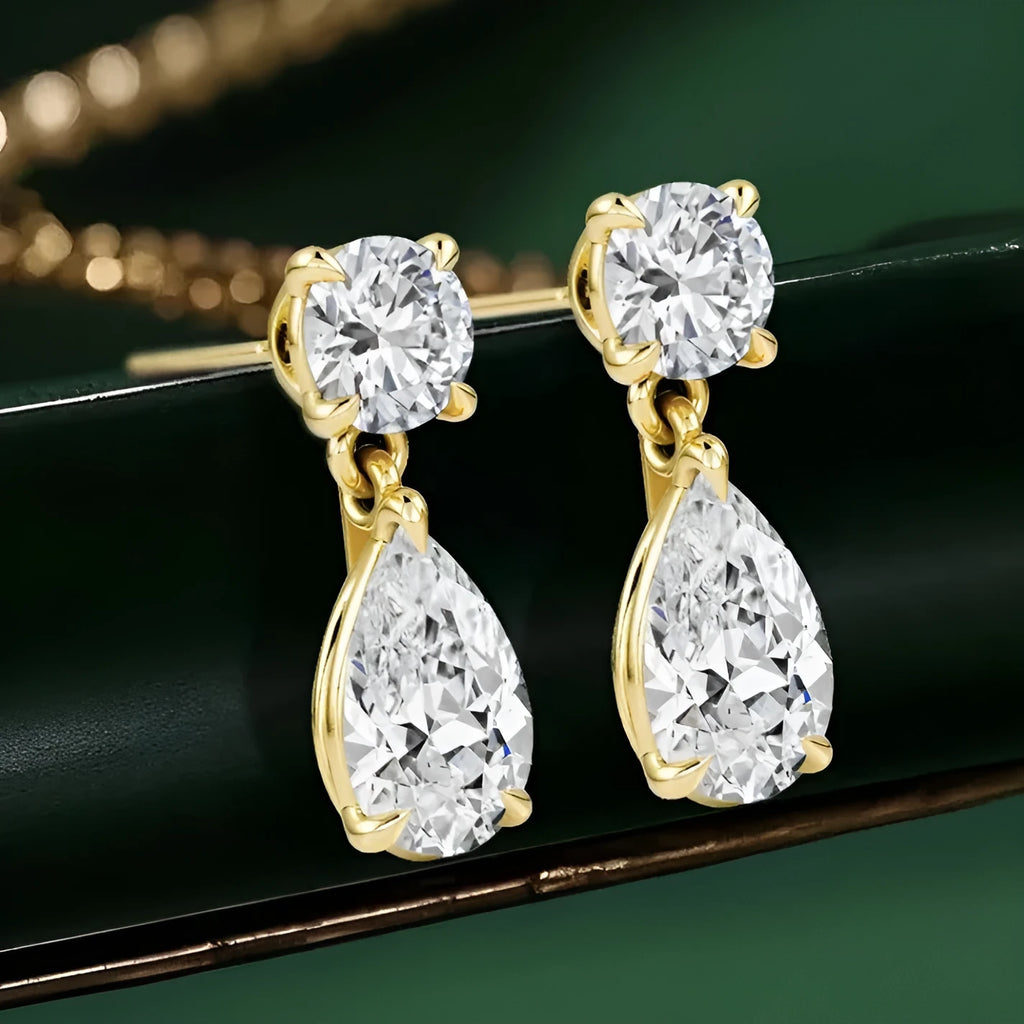 Water drop moissanite stud earrings in sterling silver with geometric shapes and gold/silver plating options