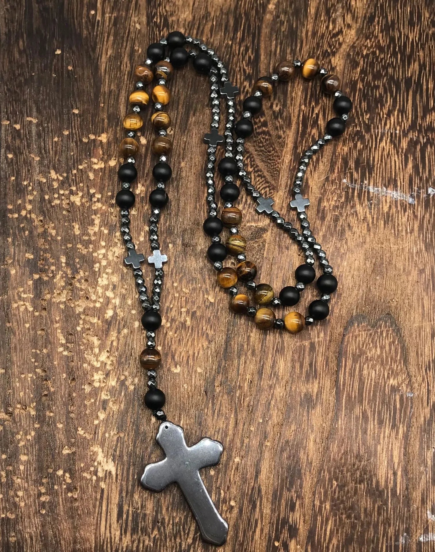 Men's stone cross pendant necklace with hand-woven detail on ball bead chain