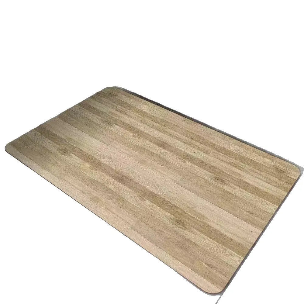 Square diatomite bathroom mat with wood grain pattern on a bathroom floor.