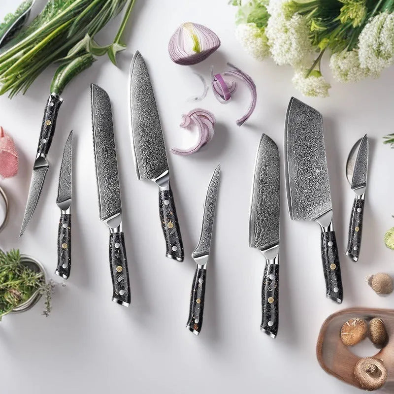 Damascus steel 8-piece kitchen knife set showing fishbone pattern on blades