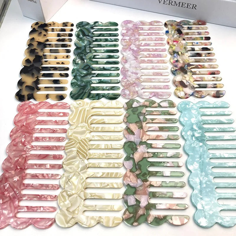 Acetate board geometric wave hairdressing comb for women in pink colour, showing wave shape and lightweight construction