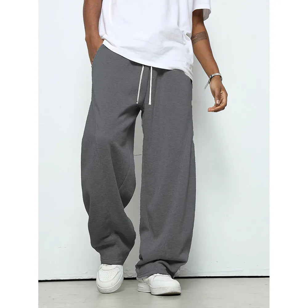 Men's straight leg casual trousers in black, dark grey and light grey colours with a drawstring waist.