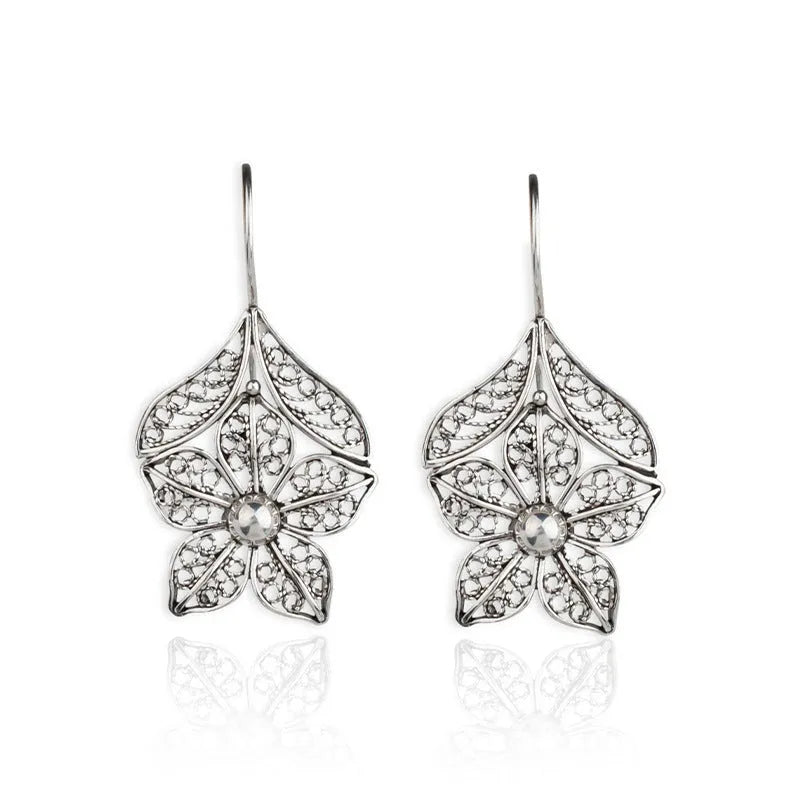 Silver-colour alloy women's earrings with a hollow retro flower leaf shape.