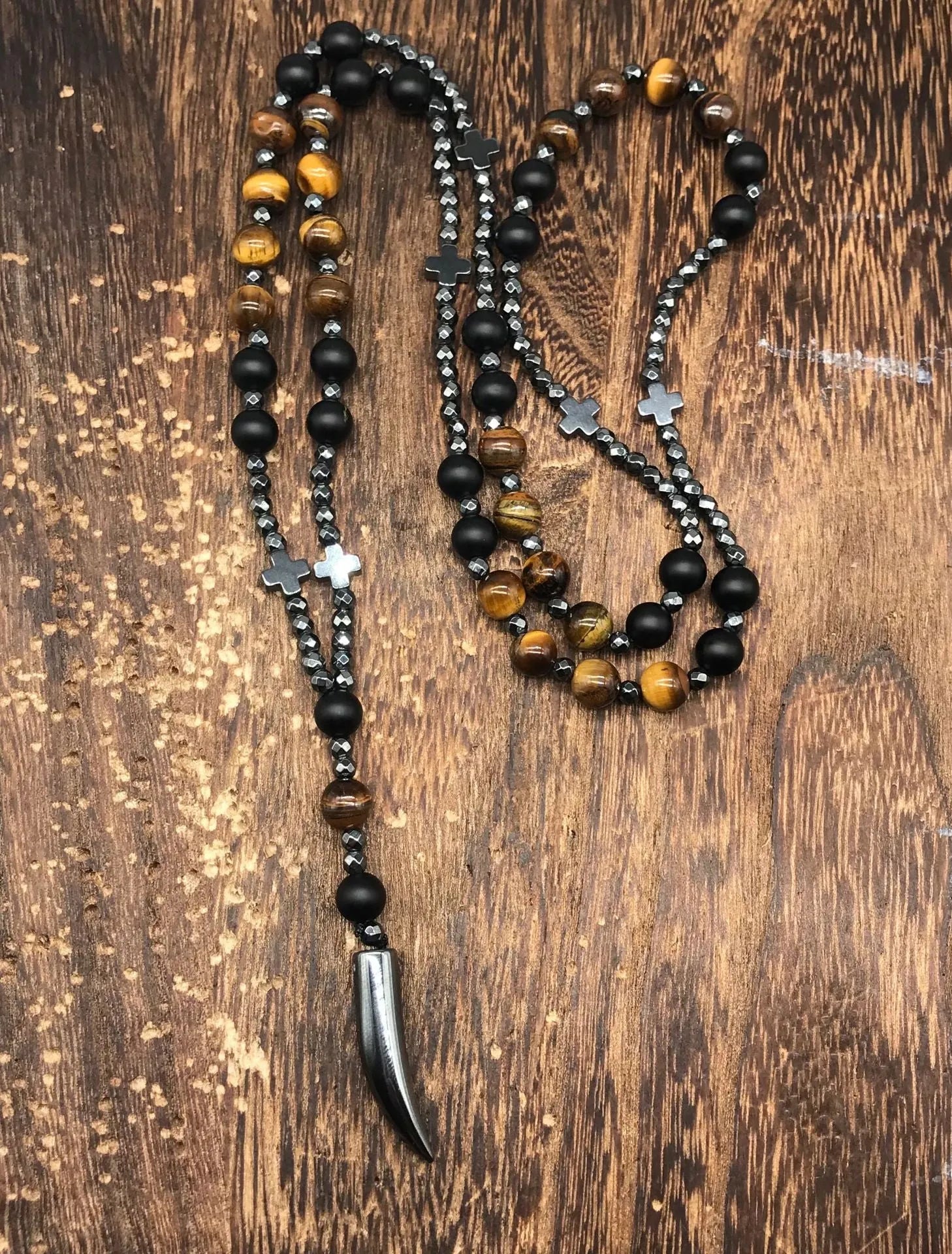 Men's stone cross pendant necklace with hand-woven detail on ball bead chain