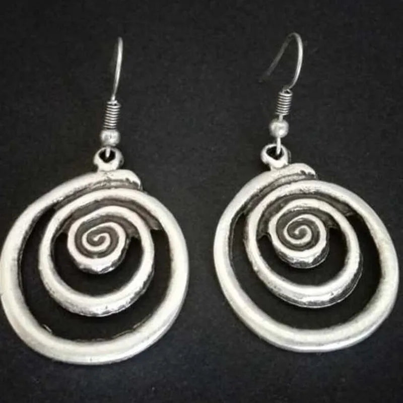 Geometric spiral earrings in distressed silver with national style design elements