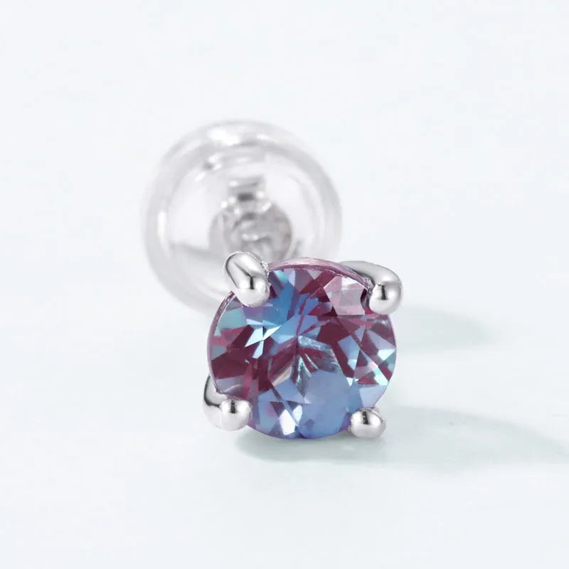 Simple geometric stud earrings with a round cultivate alexandrite stone on a 925 silver post.
