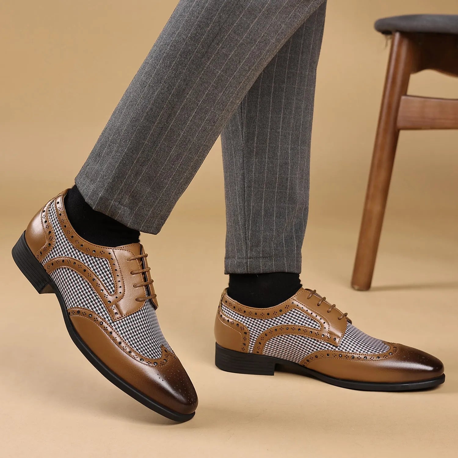 Man's imitation houndstooth plaid casual shoe in black with square toe and lace-up front.