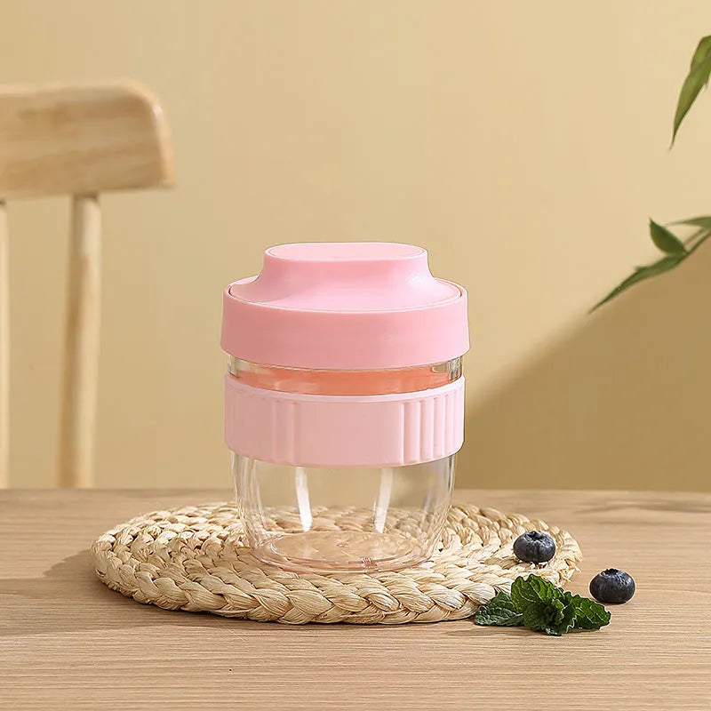 Green microwave-safe plastic salad cup with white resealable lid and integrated spoon, shown with capacity options.