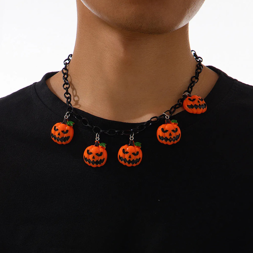 Mixed colour ghost pumpkin acrylic necklace on a regular chain, cartoon Halloween styling.