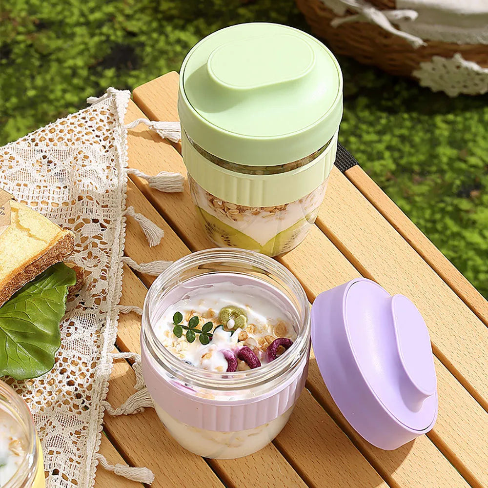 Green microwave-safe plastic salad cup with white resealable lid and integrated spoon, shown with capacity options.