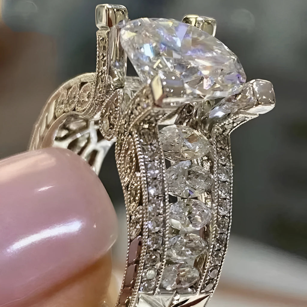 Women's silver geometric engagement ring with electroplated gold or white finish and round design