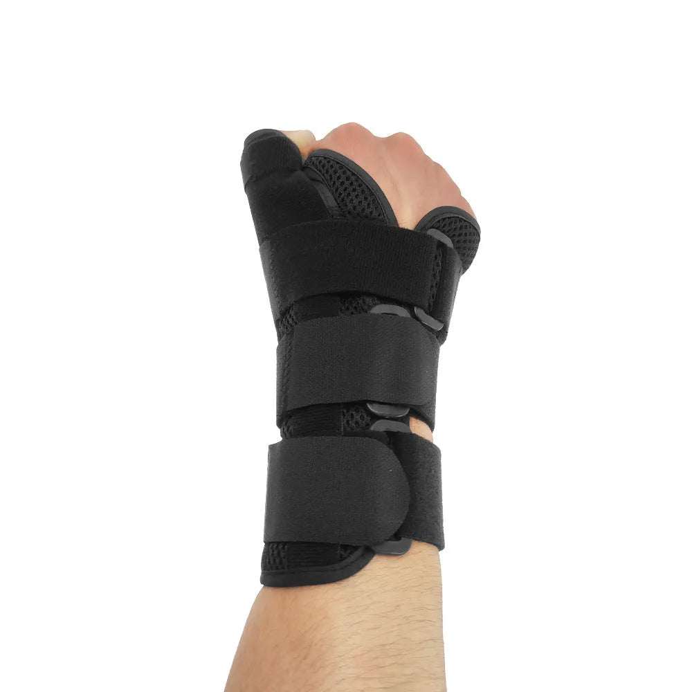 Carbon fibre sports wrist guard with thumb strap shown in black with grey edging, for left or right hand.