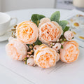 Silk artificial peony bouquet arrangement in champagne colour for home or wedding decor.