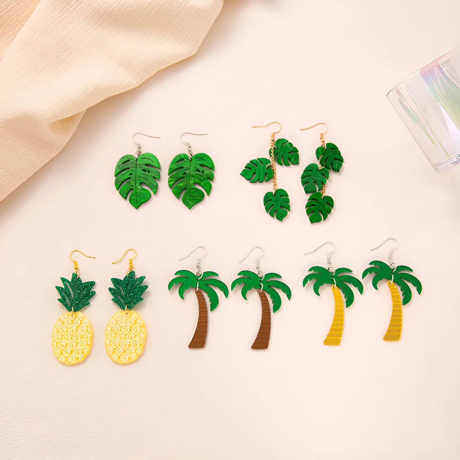 Colourful acrylic jackfruit-shaped drop earrings on an alloy hook, showing one of five style variations.
