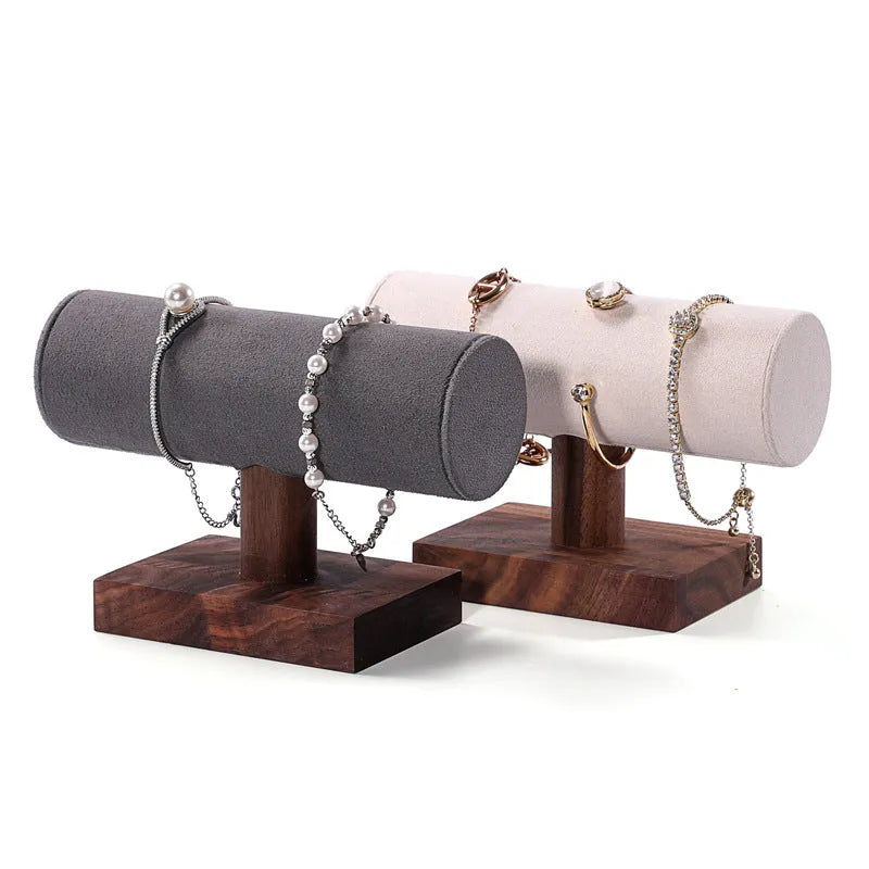 Walnut bracelet display stand with solid wood frame and beige velvet cushion