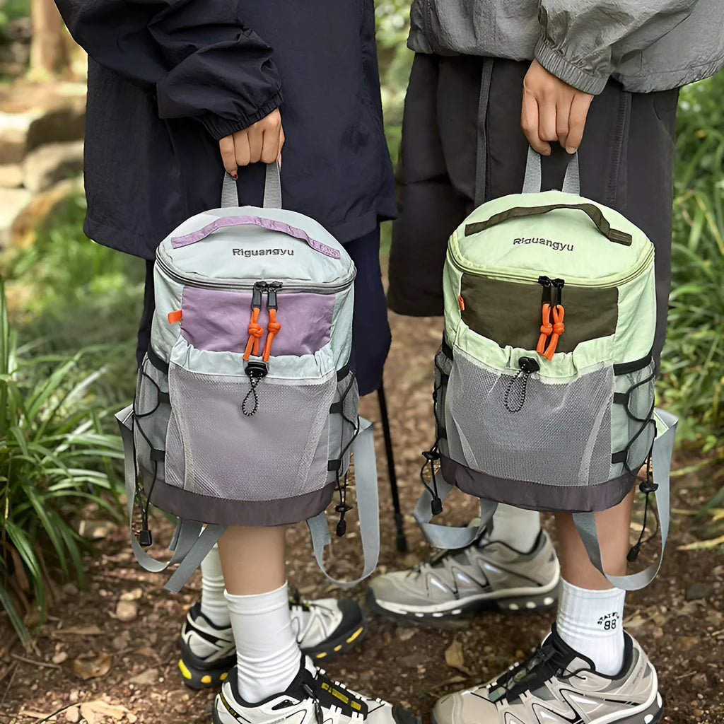 Japanese style casual backpack in waterproof nylon with a curved shoulder strap, shown in a solid colour.